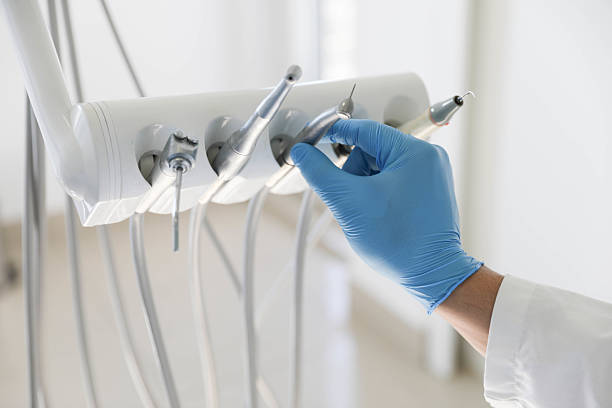 Professional Root Canal Treatment technician working in Russells Point, OH